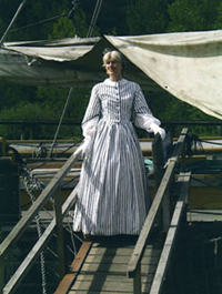 Tania Crosse infront of the Garland Stone